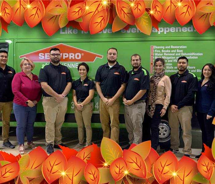 SERVPRO of Cheyenne employee group photo with fall leaves frame